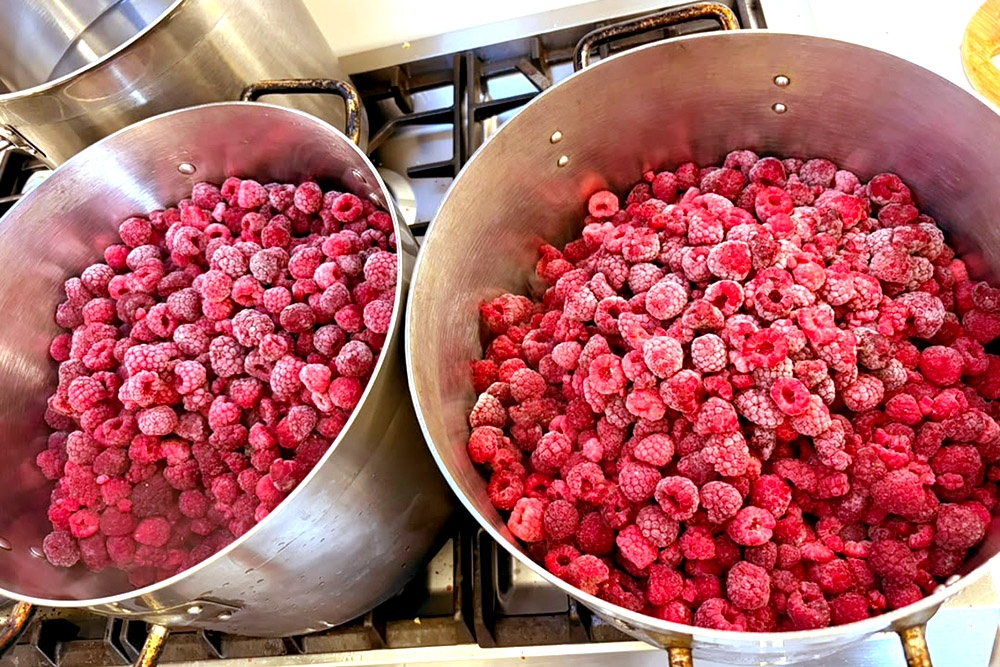 Simmering raspberries to make artisan raspberry compote. — Picture courtesy of Giggles PJ