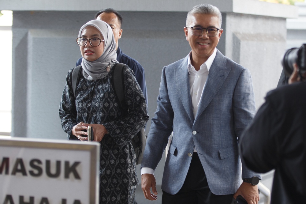 Former finance minister Datuk Seri Tengku Zafrul Abdul Aziz arrives at the Kuala Lumpur High Court Complex to testify as a key prosecution witness at the corruption trial involving former Prime Minister Tan Sri Muhyiddin Yassin July 7, 2026. — Picture by Raymond Manuel