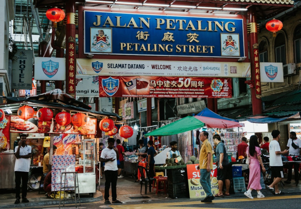 File picture of Petaling Street. According to the author, the framework rests on four pillars — Prevention, Empowerment, Promotion, and Protection — and acknowledges what social scientists have been screaming for decades: you cannot solve poverty with cash alone. You must address the wreckage of unemployment, family breakdown, poor health, psychological trauma, and insecure housing simultaneously. — Pexels.com pic