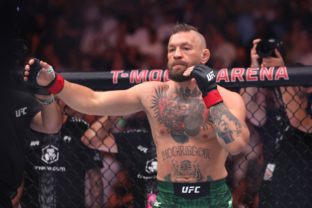 Conor McGregor walks out before facing Max Holloway in their UFC 329 welterweight bout at T-Mobile Arena in Las Vegas on July 11, 2026. — AFP pic