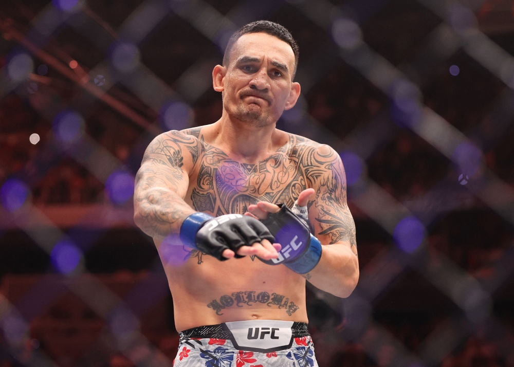 Max Holloway celebrates after defeating Conor McGregor in their UFC 329 welterweight bout at T-Mobile Arena in Las Vegas on July 11, 2026. — AFP pic