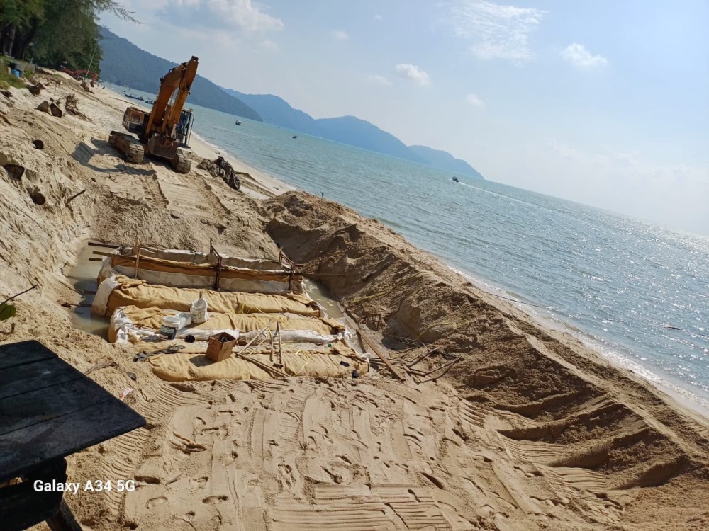 The anti-erosion works to protect the famous Batu Ferringhi shoreline began on July 8, 2026 and are expected to be completed by August 10. — Picture courtesy of Zairil Khir Johari’s office
