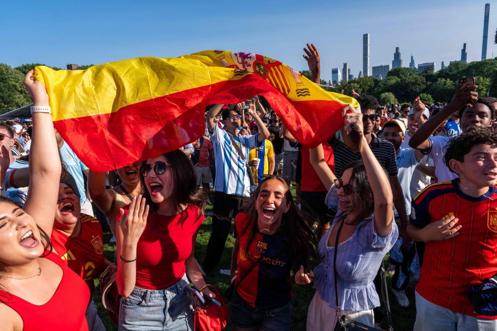 Spain fans celebrate their team’s 2026 World Cup victory during a watch party in Central Park, New York. — Getty Images pic via AFP