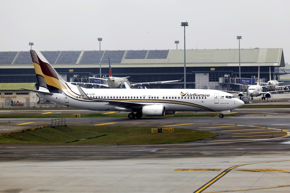 An AirBorneo Boeing 737-800 aircraft lands at KLIA Terminal 1 in Sepang today. — Bernama pic
