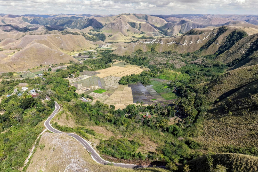 This photo taken on June 23, 2026 shows an aerial view of the landscape surrounding Tanggedu village in East Sumba, East Nusa Tenggara. — AFP pic
