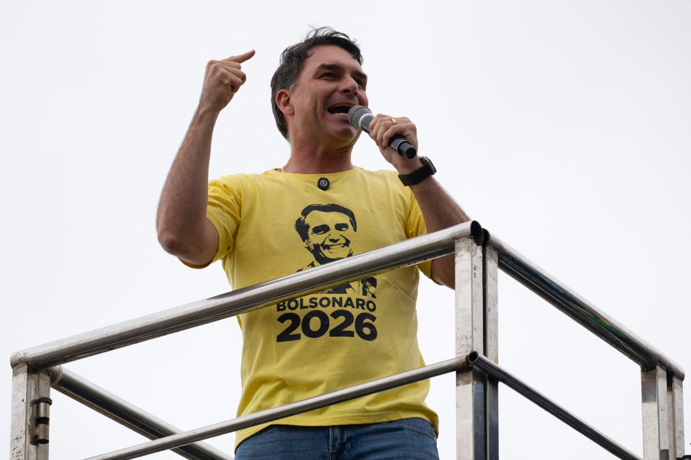 Brazil’s senator Flavio Bolsonaro, son of Brazil’s former president (2019-2022) Jair Bolsonaro, on trial for his alleged role in an attempted coup, delivers a speech in a demonstration during Independence Day, at Copacabana beach in Rio de Janeiro, Brazil on September 7, 2025. — AFP pic