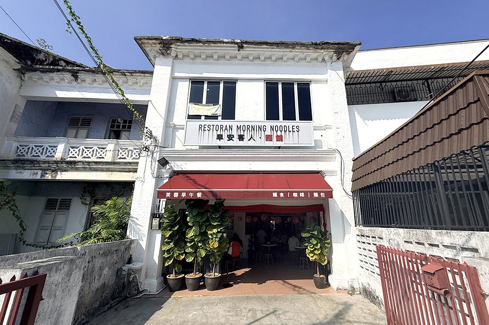 The large pots of fiddle-leaf figs at the entrance provide shade from the sun. — Pictures by CK Lim