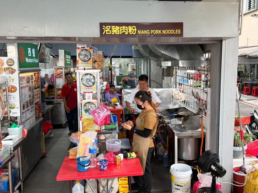 Hidden by another stall, Niang Pork Noodles is just inside the corner coffee shop — Picture by Lee Khang Yi