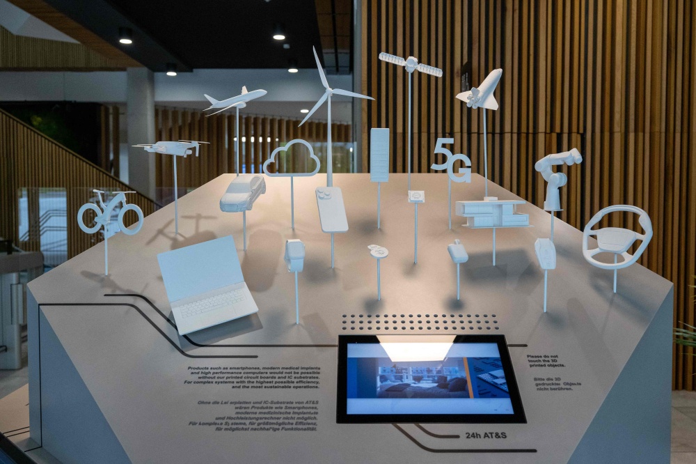 An installation shows examples of applications using AT&S products at the company’s headquarters in Leoben, Styria, Austria, on August 11, 2026. — AFP pic