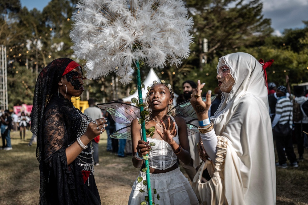 Cosplayers and Japanese culture fans discuss their outfits during the Otamatsuri convention in Nairobi on August 22, 2026. — AFP pic