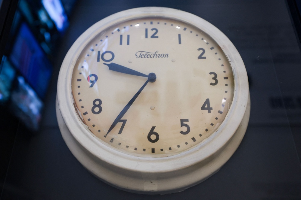 A clock that hung in the Pentagon on September 11, 2001 is displayed during a media preview of the National Museum of the United States Army’s new 9/11 commemorative exhibit ‘Steel & Stone’ at Fort Belvoir, Virginia, on August 27, 2026, ahead of the 25th anniversary of the attacks. — Getty Images via AFP