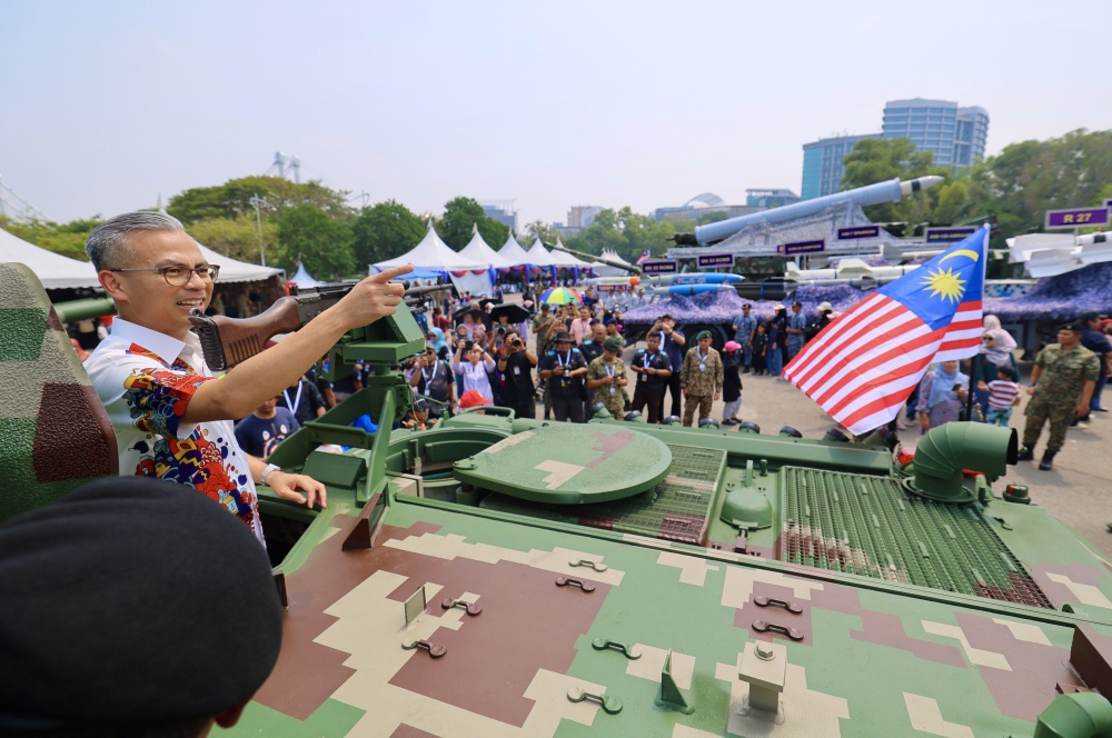 Communications Minister Datuk Seri Fahmi Fadzil inspects machinery showcased to the public as part of the Malaysian Armed Forces’ (MAF) asset participation in the 2026 National Day parade at Dataran Putrajaya August 29, 2026. — Bernama pic