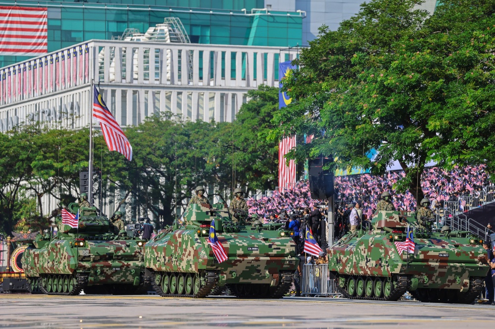 A column of tanks is seen during the National Day 2026 parade at Dataran Putrajaya in Putrajaya on August 31, 2026. — Picture by Yusof Isa