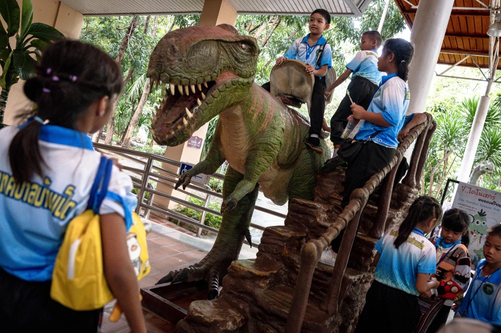 Students visit Phu Wiang Dinosaur Museum in Khon Kaen on August 19, 2026. Researchers have found a trove of dinosaur fossils in Khon Kaeon province, which holds the country's richest deposits, offering insight into the creatures that roamed the planet millions of years ago. — AFP pic