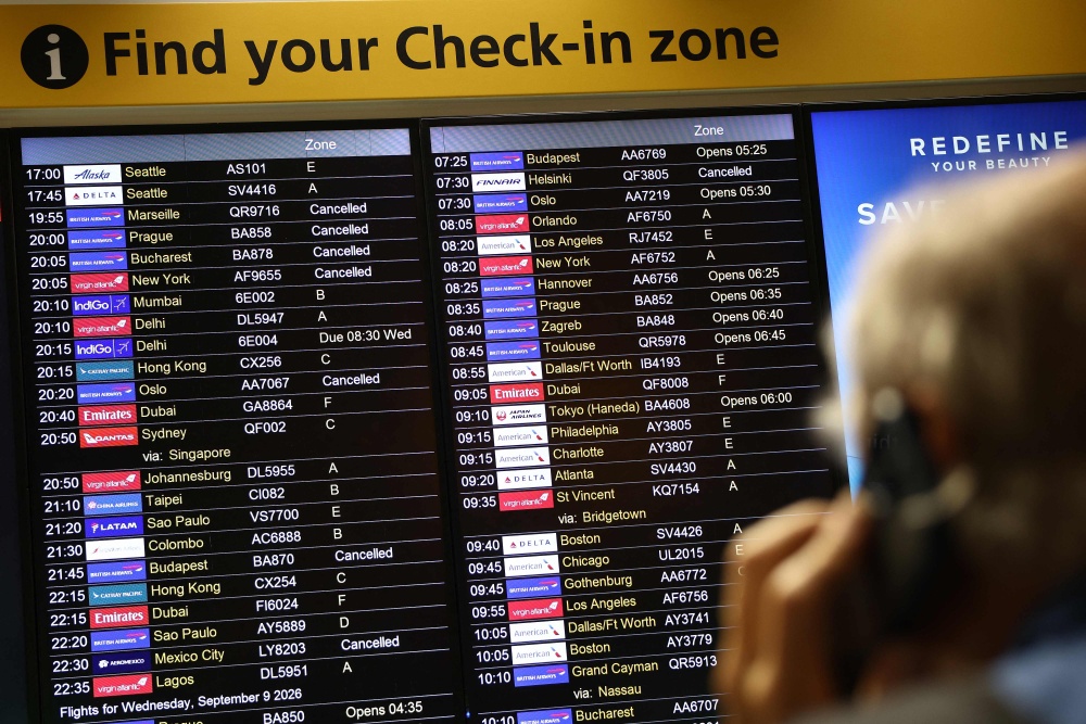 Cancelled flights are pictured on an electronic check-in display board at Terminal 3 of London Heathrow airport, west of London on September 8, 2026, following major disruption due an issue affecting the NATS air traffic control systems. — AFP pic