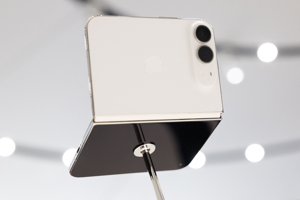 Apple’s iPhone Duo, the company’s first foldable smartphone, are displayed at Apple’s ‘Surprise and Shine’ event at the company’s corporate headquarters, Apple Park in Cupertino, California September 9, 2026. — Benjamin Fanjoy/Getty Images North America/Getty Images pic via AFP
