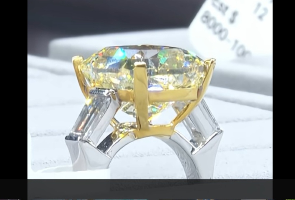  A 15.02-carat yellow diamond ring had attracted a top bid of S$190,000 against an estimate of S$200,000 to S$300,000. — Screengrab from CNA