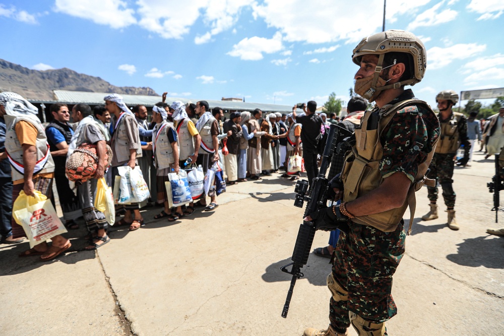 Yemeni prisoners loyal to the Houthi authorities stand in line after being liberated from prisons on the west coast where they were being held by Yemen’s Saudi-backed government forces, as they arrive in the capital Sanaa on September 12, 2026. — AFP pic