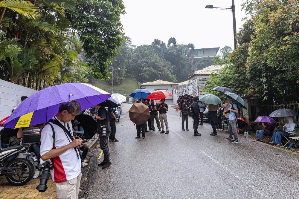 Members of the media gather outside former prime minister Datuk Seri Najib Razak’s residence following the announcement of his conditional pardon in Kuala Lumpur on September 18, 2026. — Picture by Firdaus Latif