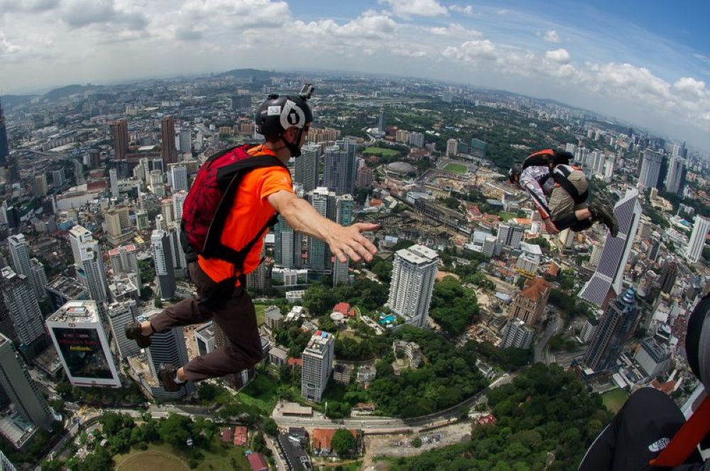 A base jumper takes his leap at the â€˜KL Tower International Jump 2017â€™ in Kuala Lumpur September 30, 2017. â€• Bernama pic