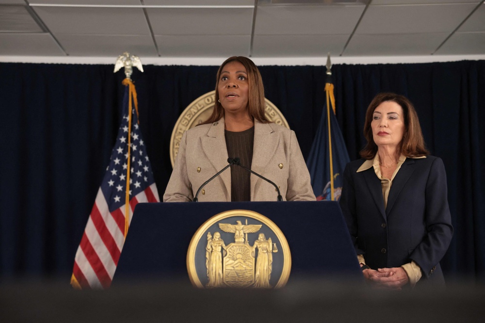 New York Attorney General Letitia James (left) stands with Governor Kathy Hochul (right) at a news conference in Manhattan, where Hochul announced a review of Cornell University’s initial response to allegations that a former student was drugged and raped by multiple men at a campus fraternity in 2024. — Getty Images pic via AFP