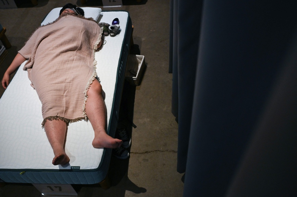 Ready, set, snooze: Sleep-deprived Japanese compete for best
