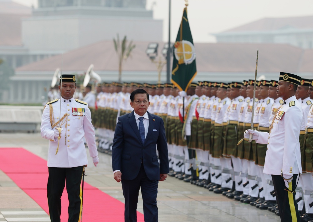 Myanmar President Min Aung Hlaing inspects a guard of honour comprising three officers and 103 personnel from the First Battalion of the Royal Ranger Regiment, led by Major Muhammad Nur Addeen Mustaza, at the Perdana Putra Complex in Putrajaya on October 8, 2026. — Bernama pic
