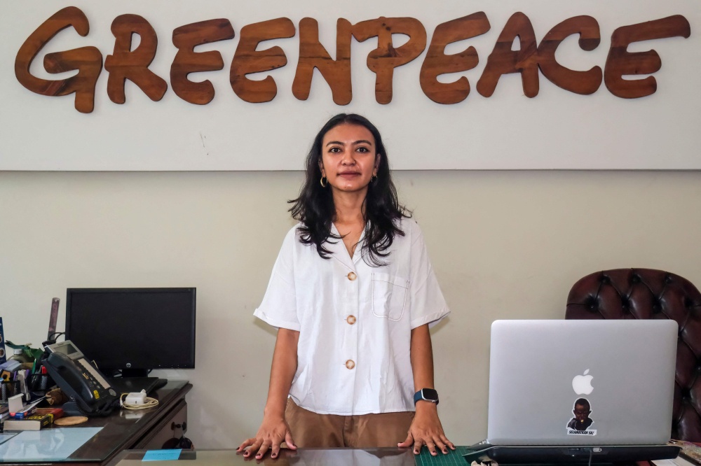 This photo taken on October 6, 2026 shows Belgis Habiba, forest campaigner for Greenpeace Indonesia, posing at the organisation’s office in Jakarta. — AFP pic