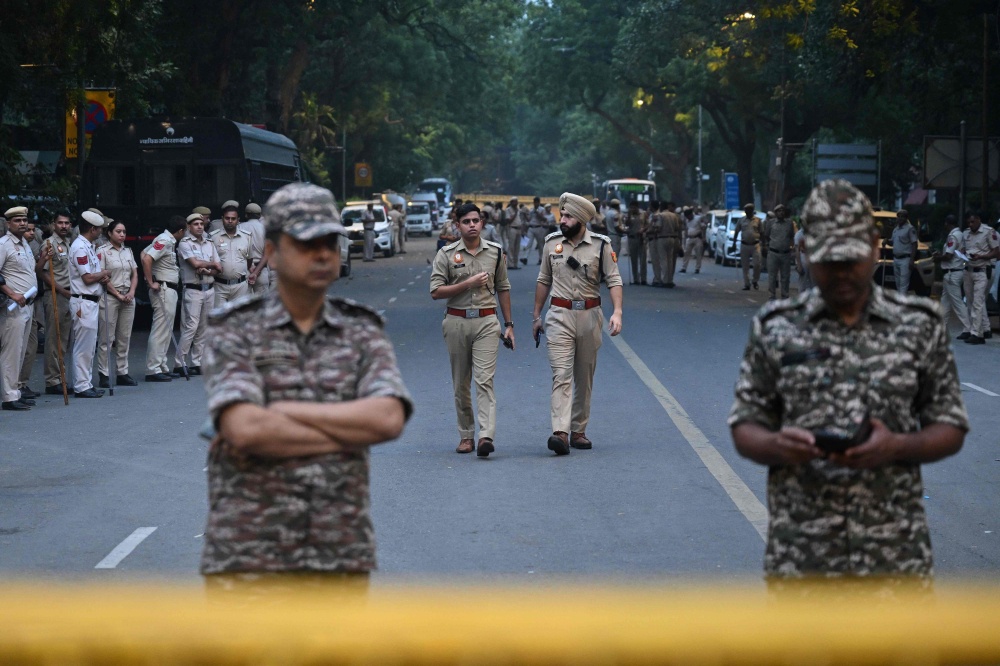 Delhi Police personnel stand guard ahead of a protest by the youth-led Cockroach Janata Party (CJP) demanding the resignation of India’s Chief Election Commissioner over alleged ‘special intensive revision’ (SIR) voter-roll irregularities, near Jantar Mantar in New Delhi October 10, 2026. — AFP pic