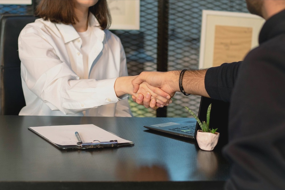 Business team aligning project requirements before hiring a web app developer