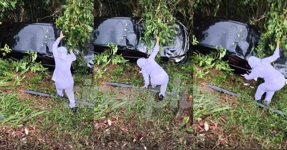 Image from: Hujan lebat, kereta jatuh gaung, tindakan nekad PPK wanita ini buat ramai sebak. 'Sudah tugas saya'