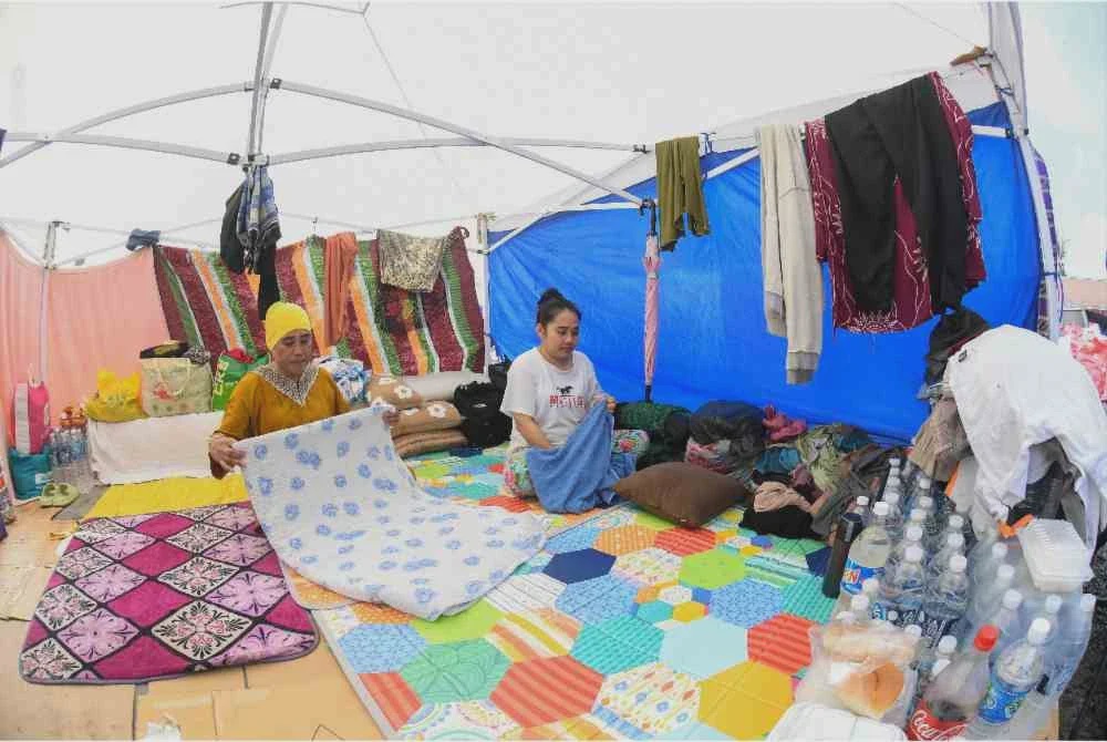 Image from: Kebakaran Kampung Bahagia: Memori tiga dekad rumah dibina arwah suami musnah sekelip mata