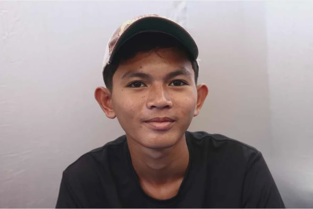 Image from: Kebakaran Sandakan: Tetap bersekolah biarpun berselipar, berpakaian biasa