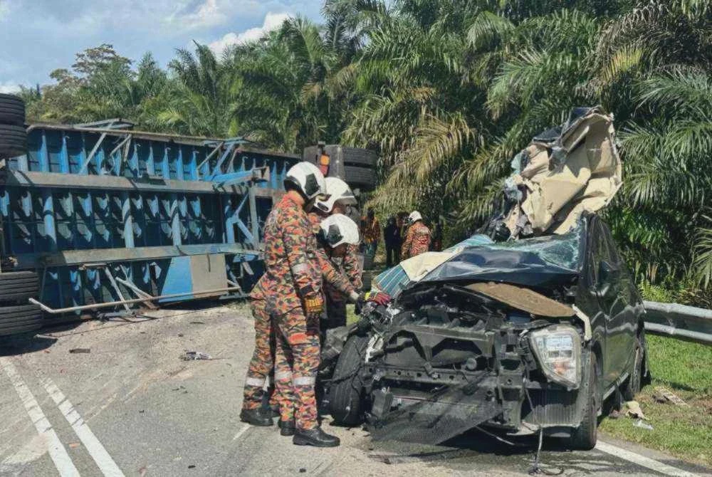 Image from: Suami maut, isteri cedera parah nahas MPV, treler