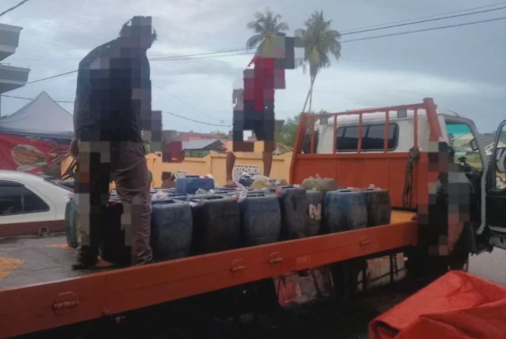 Image from: Stor haram dekat tanah perkuburan simpan 825 liter diesel diserbu
