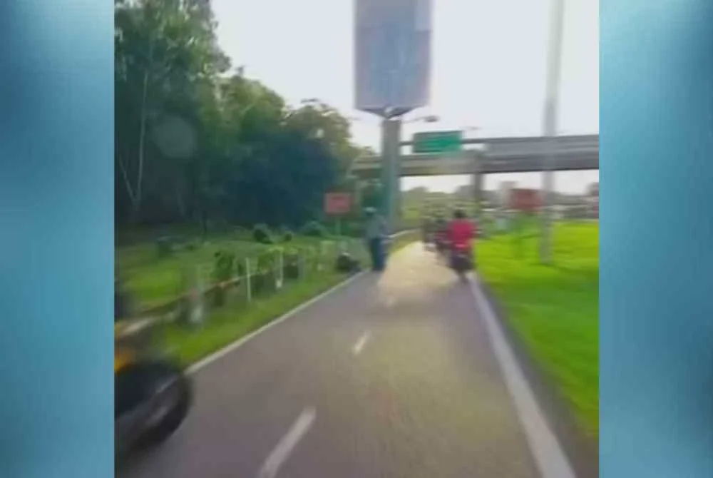 Image from: Berang kena hon, lelaki tetak penunggang motosikal dengan pisau pemotong daging