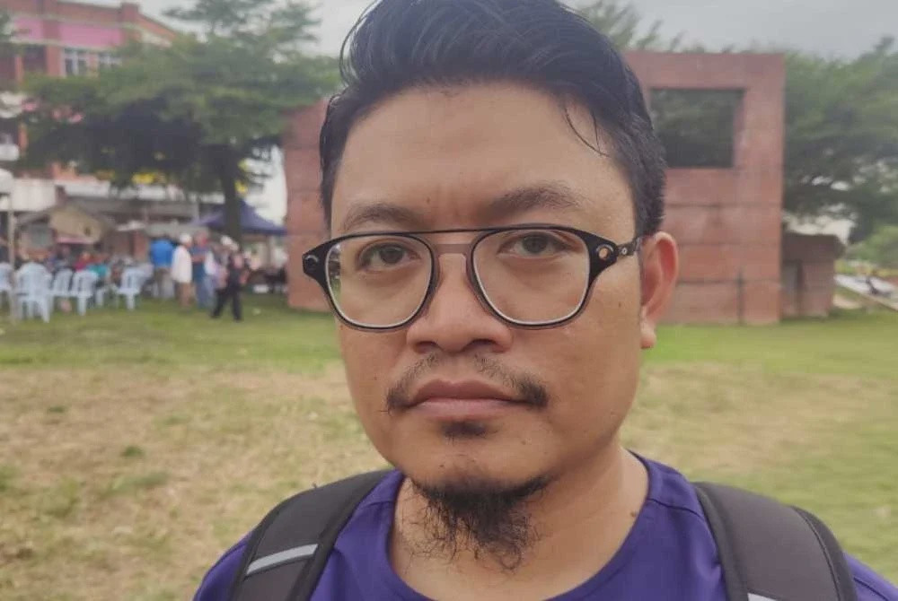 Image from: Penduduk usung replika jenazah, desak isu Persiaran Mokhtar Dahari diselesaikan segera