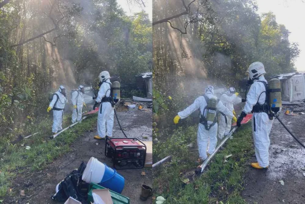 Image from: Lori tangki terbalik, 1,000 liter asid hidroklorik tumpah