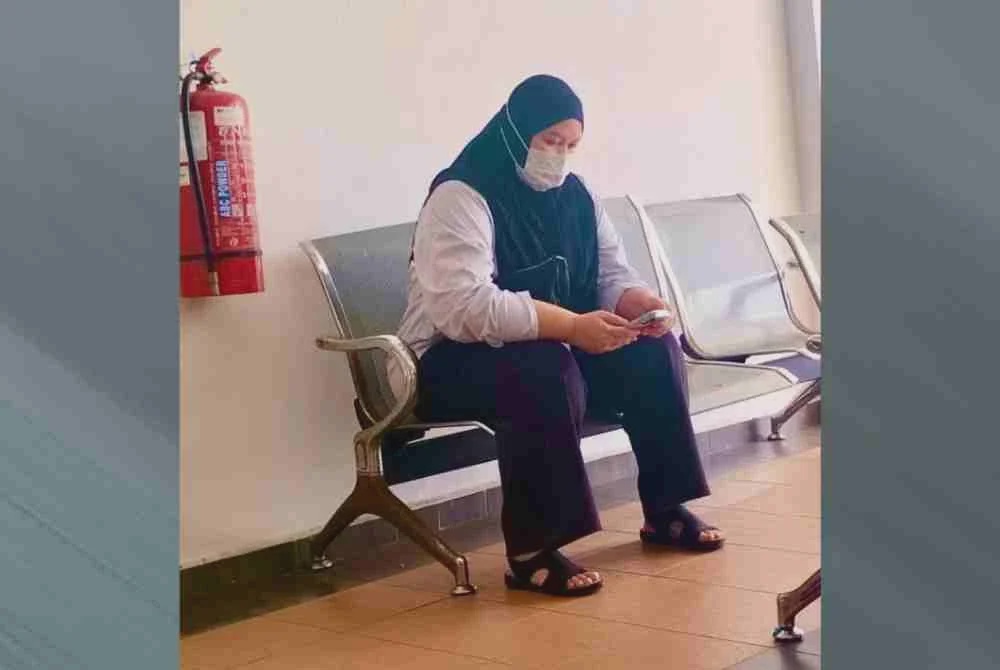Image from: Bekas kerani didakwa pecah amanah, wang RM33,827 masuk akaun sendiri, suami