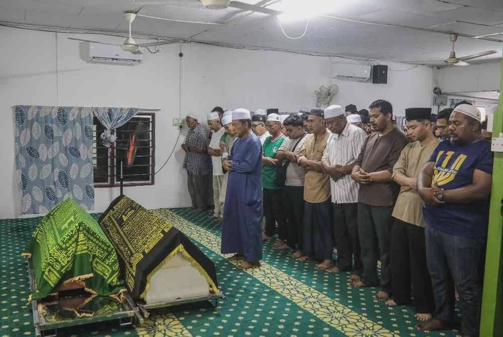 Image from: Dua mangsa kepala air disemadikan dalam satu liang lahad