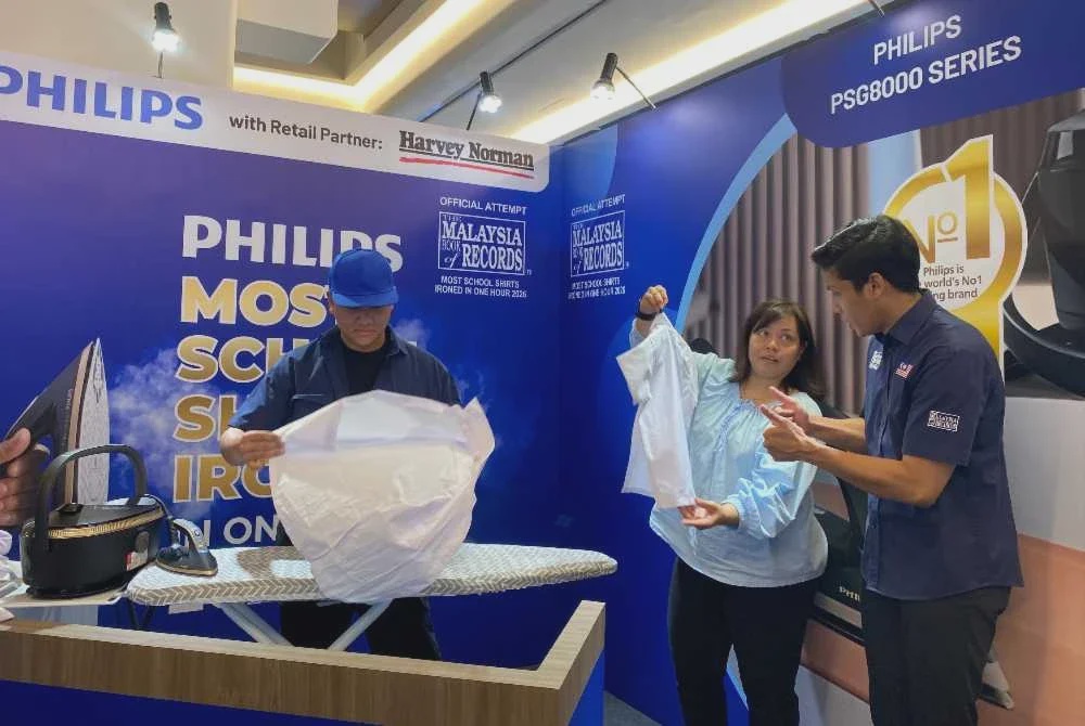 Image from: Seterika 49 baju sekolah dalam sejam, Philips cipta rekod MBOR