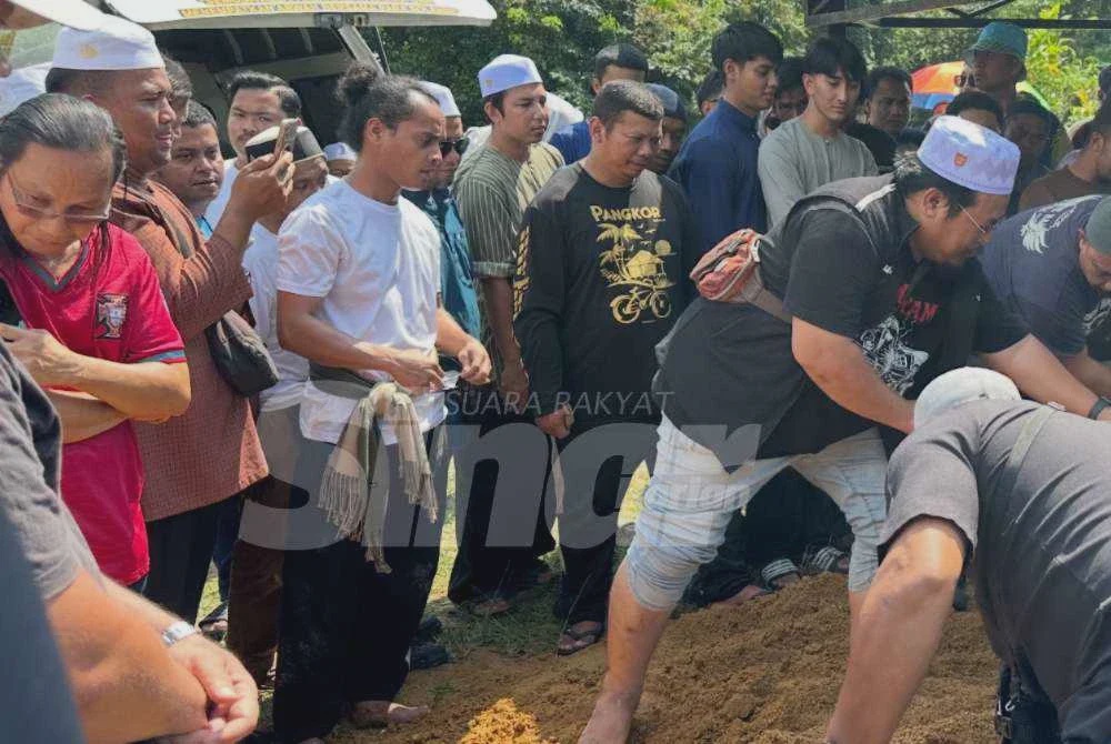 Image from: Jenazah Cik Man selamat dikebumikan di Tanah Merah