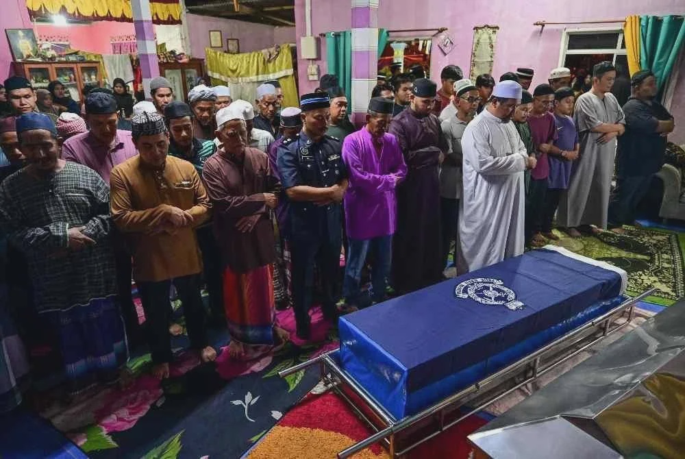 Image from: Suasana pilu iringi kepulangan Konstabel Muhammad Raimi
