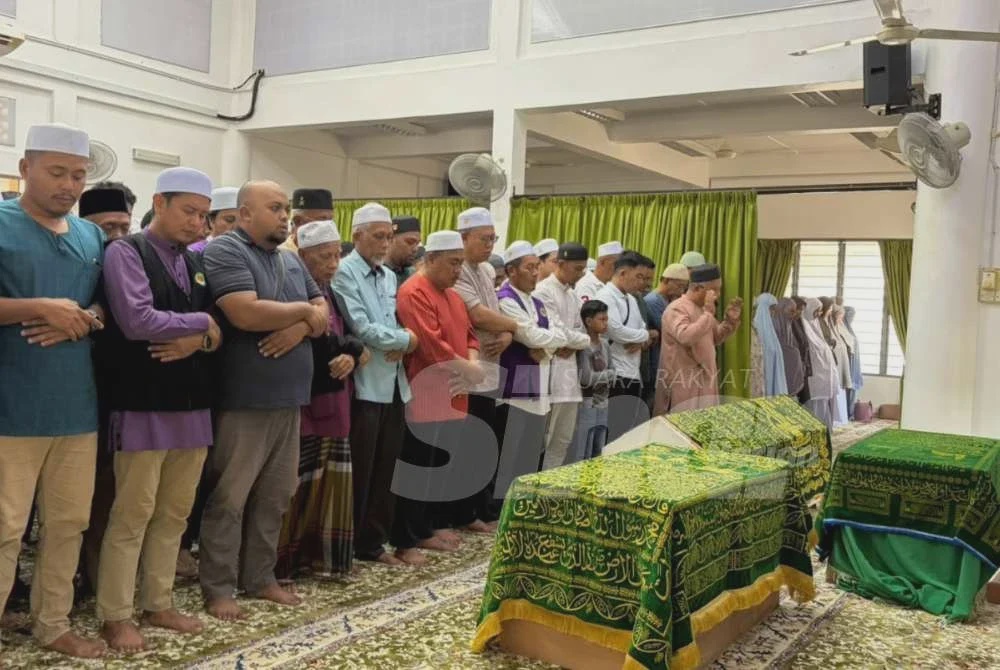 Image from: Kereta terbakar dihempap lori tangki: Jenazah ibu, anak selamat dikebumikan