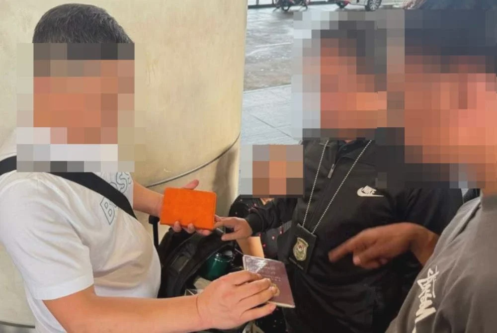 Image from: Rumah mewah jadi sarang scam, 21 individu dicekup