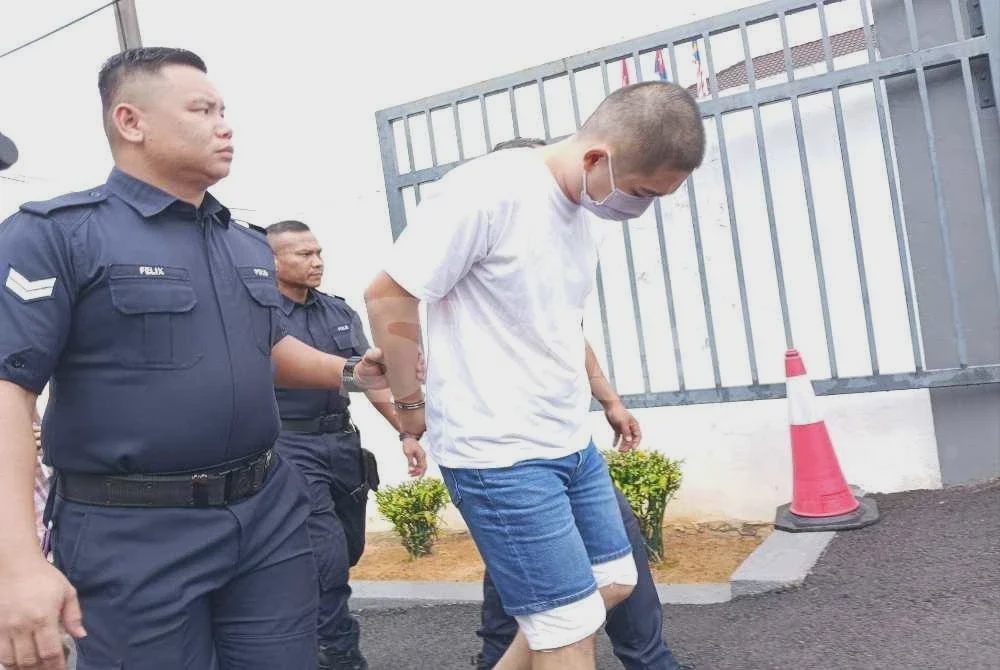 Image from: Peniaga kenderaan terpakai didakwa miliki pistol tanpa kebenaran