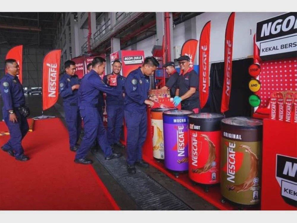 Image from: Lebih 200,000 cawan NESCAFÉ suntik semangat TUDM, peserta perarakan Merdeka