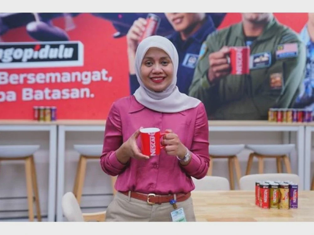Image from: Lebih 200,000 cawan NESCAFÉ suntik semangat TUDM, peserta perarakan Merdeka