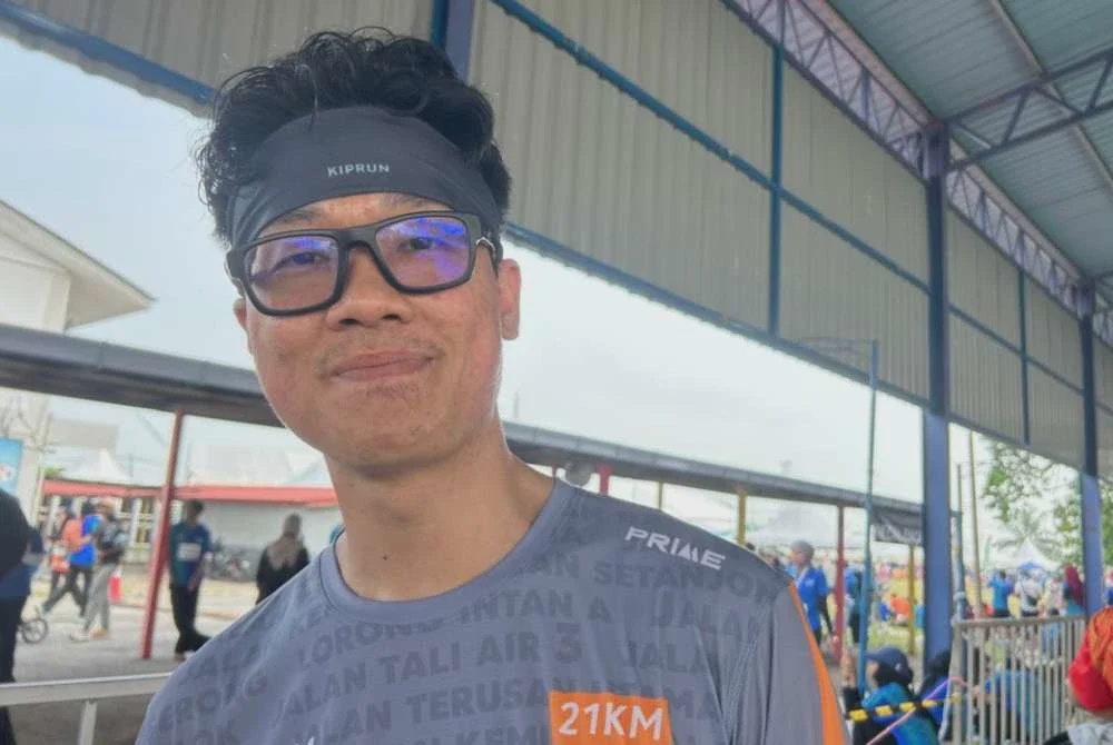 Image from: Bergantung alat pernafasan, Adam teruja harungi larian 8km bersama bapa