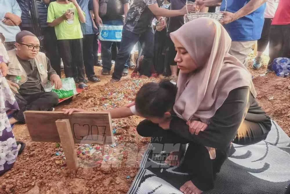 Image from: Jenazah Kapten Zainol Afiq selamat dikebumikan